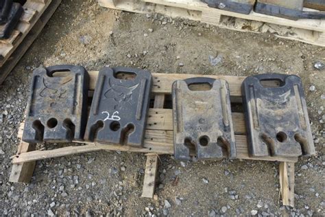 skid steer weights